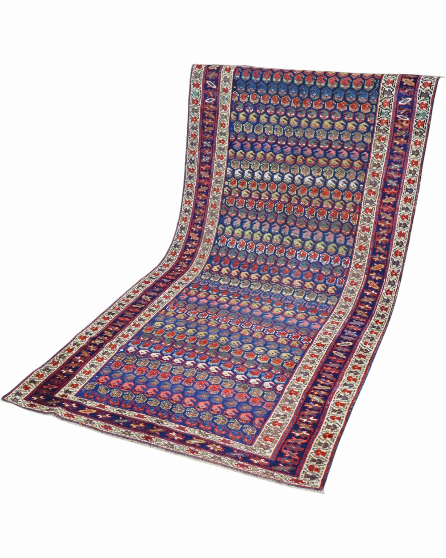 Tappeto Caucaso Antico 266x136 cm con piccoli motivi ripetuti e bordure ornamentali nei toni del blu e avorio.