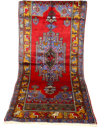 Tappeto Orientale Caucaso Antico 230x97 cm fatto a mano con design geometrico tradizionale.