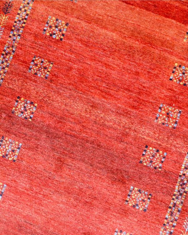 Tappeto Kashan geometrico rosso 150x100 cm in camera da letto