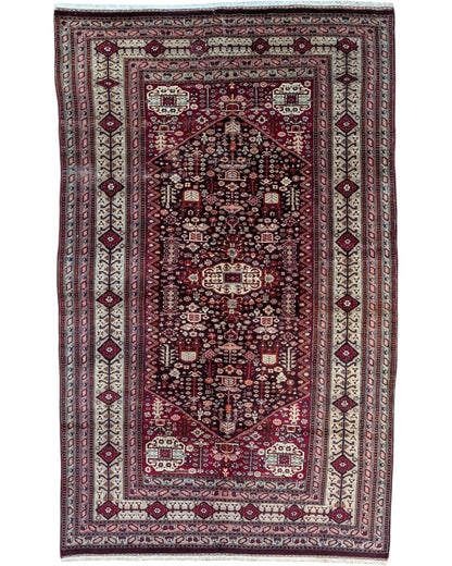 Tappeto Kashmir Antico 202x126 cm annodato a mano con medaglione a losanga e motivi geometrici.