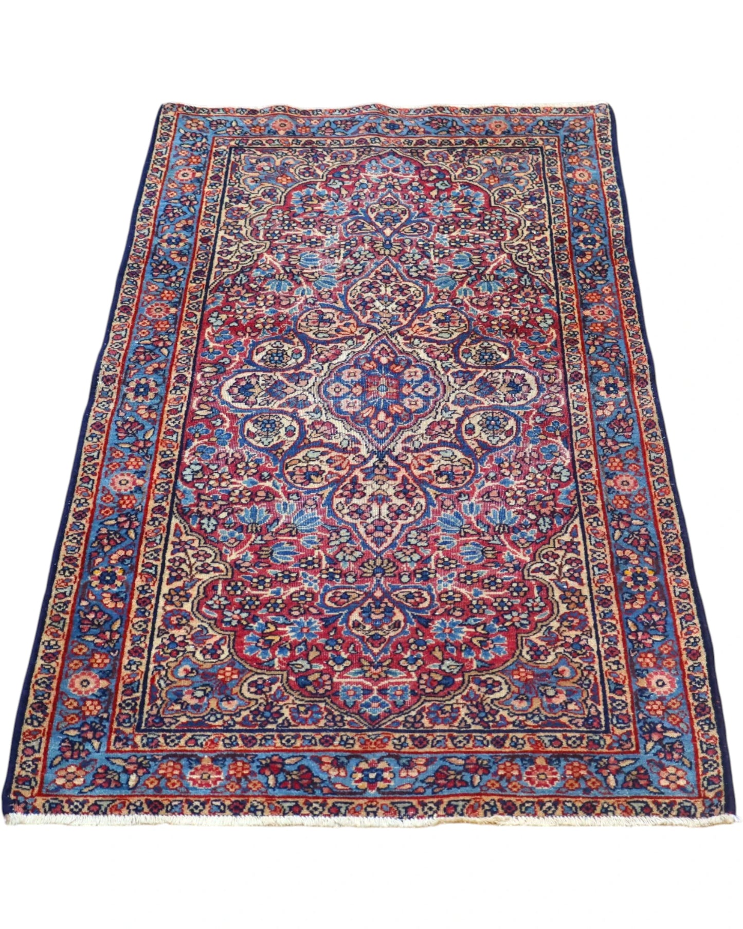 Tappeto Liliyan 180x50 cm annodato a mano con medaglione floreale e bordure blu decorate.