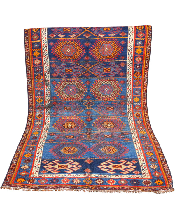Tappeto Lerial Antico 225x142 cm in lana con design orientale dai colori blu, rosso e avorio.