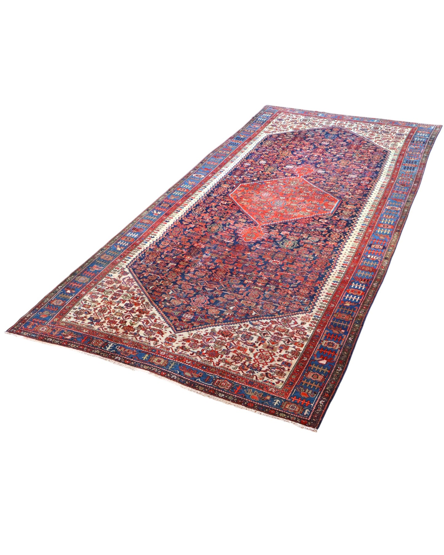 Tappeto persiano Malayer 390x297 cm, fondo blu con medaglione geometrico rosso, estremità avorio e cornice floreale, annodato a mano in lana vegetale.