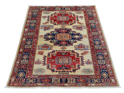 Tappeto Kazak 171x117 cm, annodato a mano in lana pregiata, motivi geometrici caucasici con medaglioni e bordura decorata.