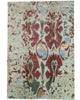 Tappeto Moderno persiano 270x184 cm con fondo verde chiaro e motivi ikat in rosso, blu e verde scuro, tramato ed annodato a mano.