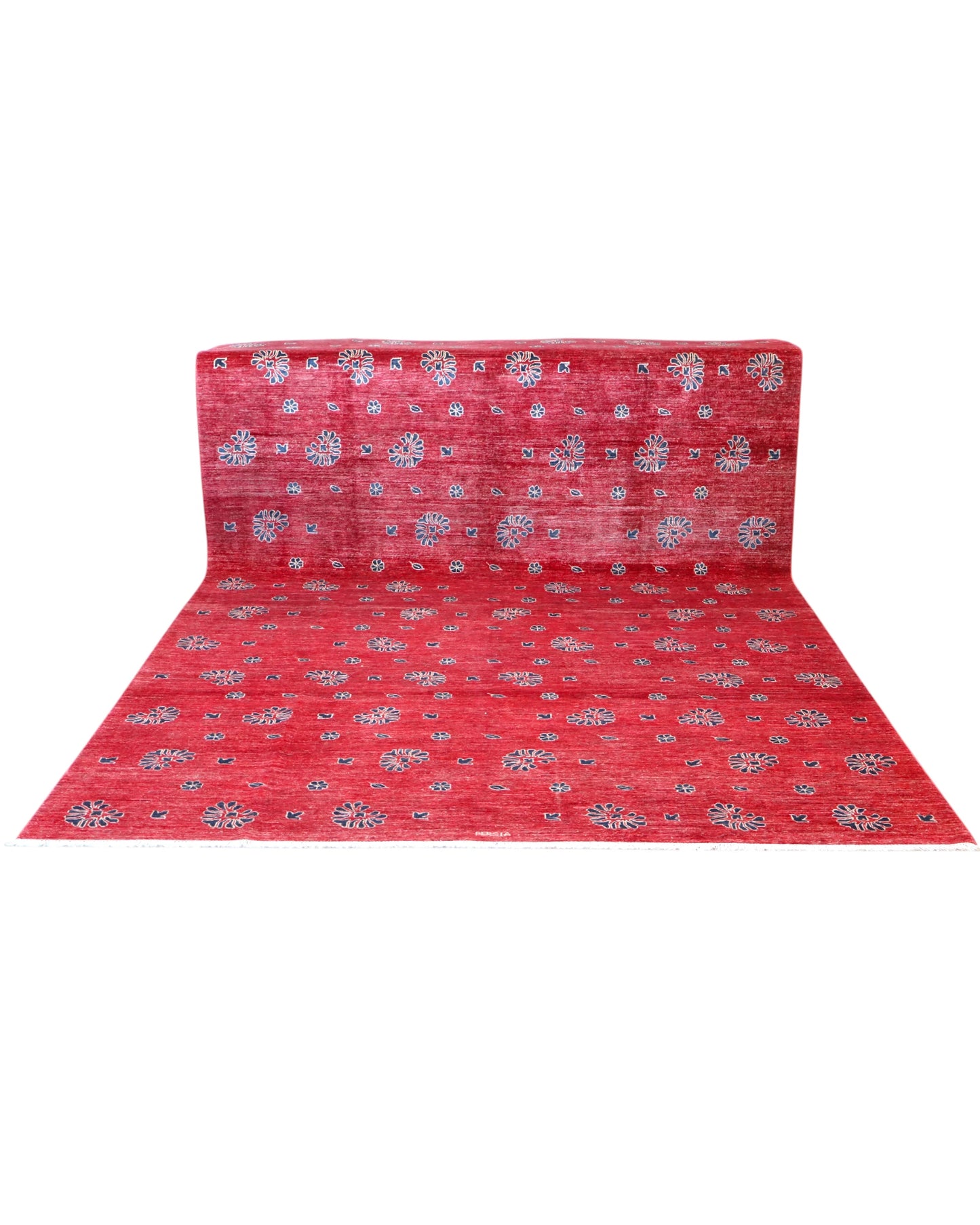 Tappeto Moderno 349x248 cm annodato a mano, rettangolare, fondo rosso con motivi decorativi stilizzati, realizzato in cotone e lana con colori vegetali.