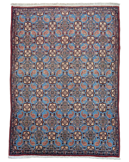 Tappeto persiano 151x107 cm azzurro con motivi geometrici in soggiorno elegante