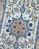 Tappeto Najafabad floreale beige 159x106 cm in camera da letto