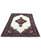 Tappeto beige e blu 240x160 cm con medaglione, ideale per camera da letto.