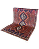Tappeto 231x168 cm blu scuro e terracotta con medaglioni per camera elegante.