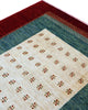 Tappeto 270x185 cm blu petrolio e avorio con cornice rossa per ingresso ampio.