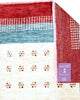 Tappeto 270x185 cm blu petrolio e avorio con cornice rossa per ingresso ampio.