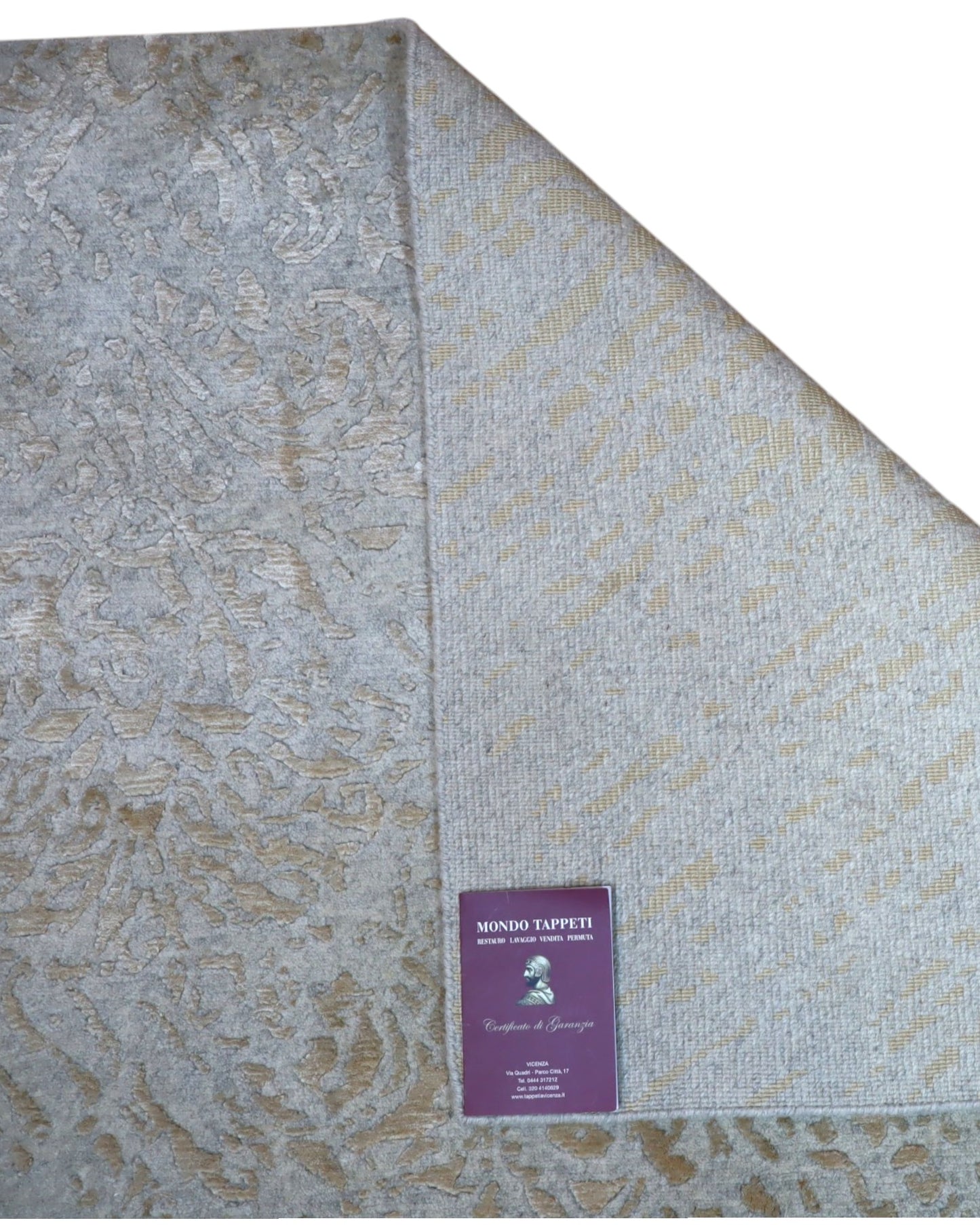 Tappeto 280x185 cm avorio e sabbia per ambiente contemporaneo elegante.