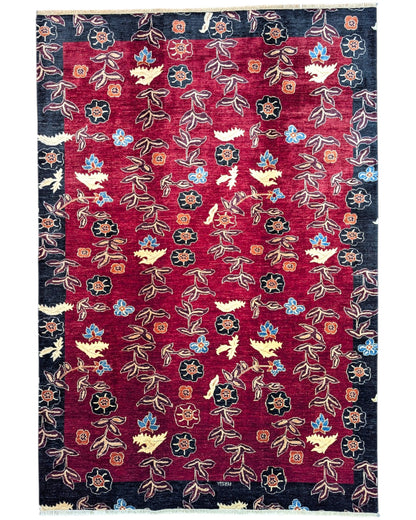 Tappeto 296x204 cm fucsia e blu con motivo floreale per soggiorno elegante.
