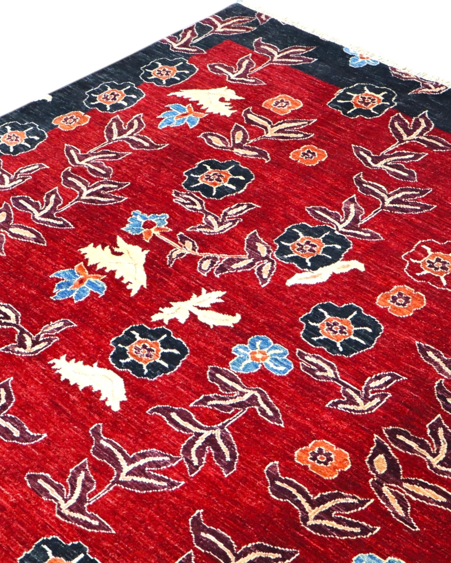 Tappeto in lana 296x204 cm con fiori stilizzati multicolore per ambiente moderno.