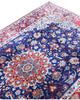 Tappeto blu e rosso con medaglione 247x156 cm per spazi raffinati.
