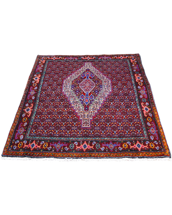 Tappeto Sanneh rosso 147x130 cm con disegni multicolore in salotto