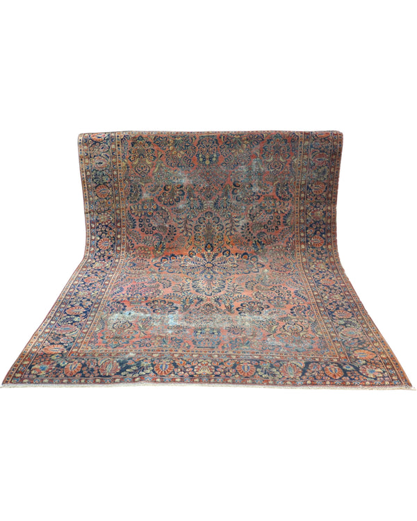 Tappeto Saruk 296x217 cm annodato a mano con medaglione centrale e ricchi motivi floreali.