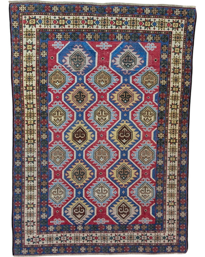 Tappeto Shirvan Antico 188x137 cm annodato a mano con medaglioni romboidali e motivi geometrici.