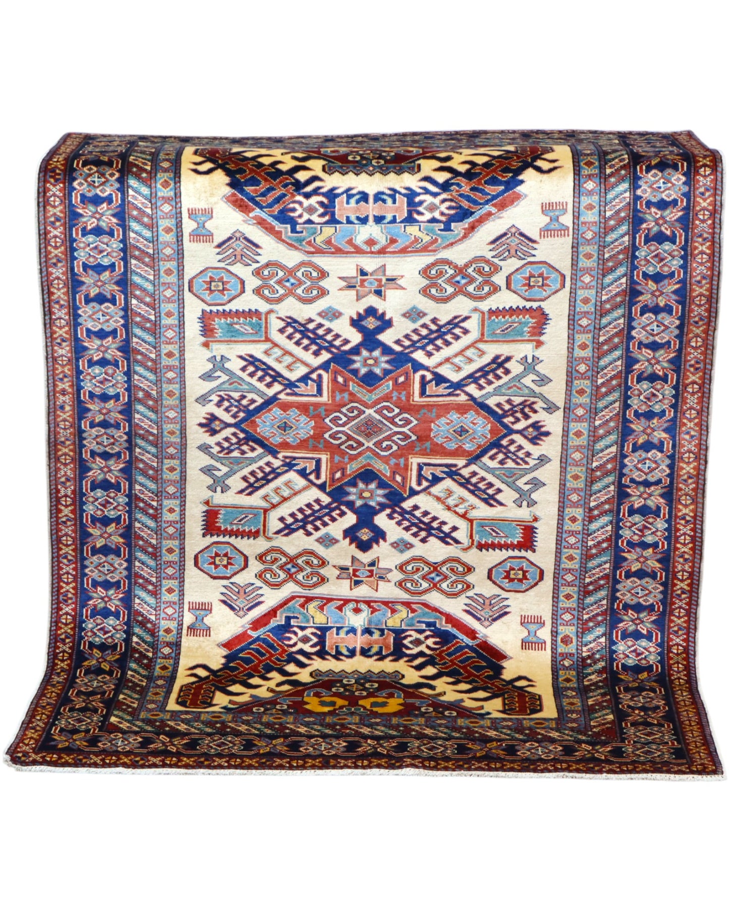 Tappeto Shirvan Afghan 157x121 cm con fondo avorio, motivi geometrici blu e rossi, tramato ed annodato a mano, provenienza Afghanistan.