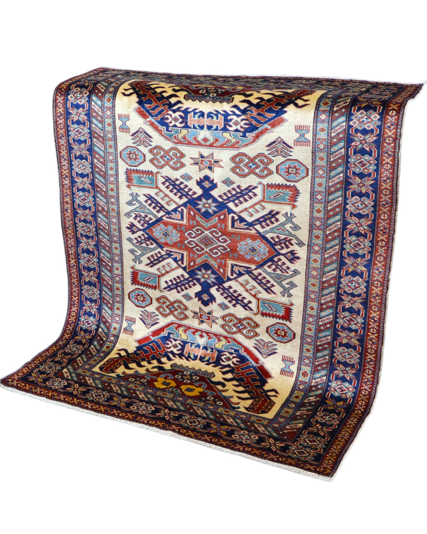 Tappeto Shirvan Afghan 157x121 cm con fondo avorio, motivi geometrici blu e rossi, tramato ed annodato a mano, provenienza Afghanistan.