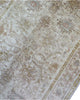 Tappeto Ziegler 185x120 cm annodato a mano con motivi floreali su fondo beige chiaro e bordura avorio.