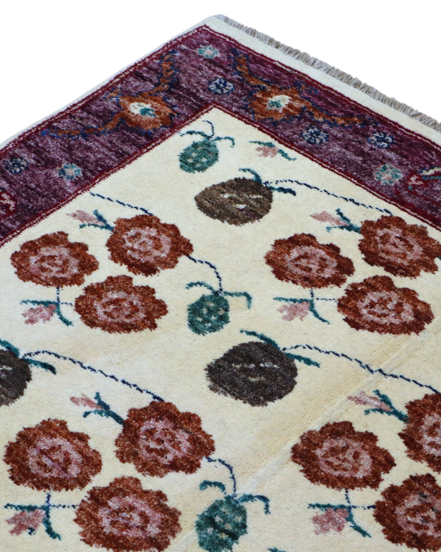 Tappeto Ziegler annodato a mano 180x126 cm con motivi floreali su fondo avorio e bordura viola.