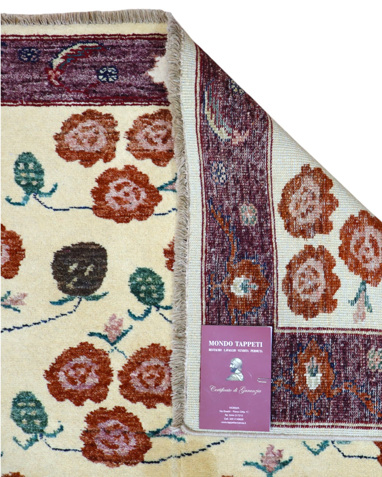 Tappeto Ziegler annodato a mano 180x126 cm con motivi floreali su fondo avorio e bordura viola.