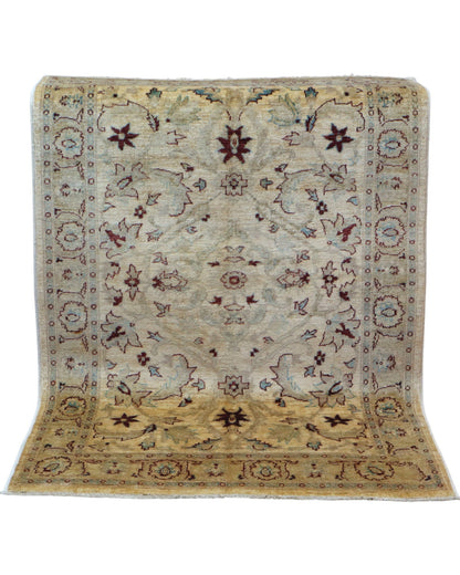 Tappeto Ziegler 182x125 cm con fondo beige e motivi floreali marroni e azzurri, tramato ed annodato a mano, provenienza Afghanistan.