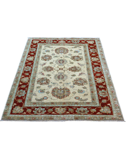 Tappeto Ziegler 184x116 cm con fondo avorio e bordura bordeaux, motivi floreali eleganti, tramato ed annodato a mano, provenienza Afghanistan.