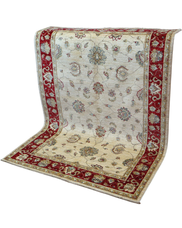 Tappeto Ziegler 175x127 cm, annodato a mano, fondo avorio con motivi floreali stilizzati e cornice rosso rubino.