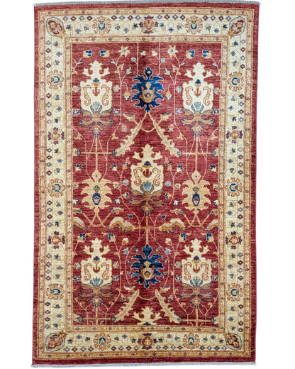 Tappeto Ziegler 170x120 cm con fondo rosso bordeaux e motivi floreali avorio e blu, tramato ed annodato a mano, provenienza Afghanistan.