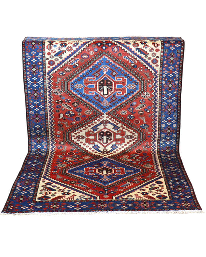 Tappeto Salame persiano 203x130 cm, annodato a mano, con tre medaglioni romboidali geometrici su fondo rosso e blu.