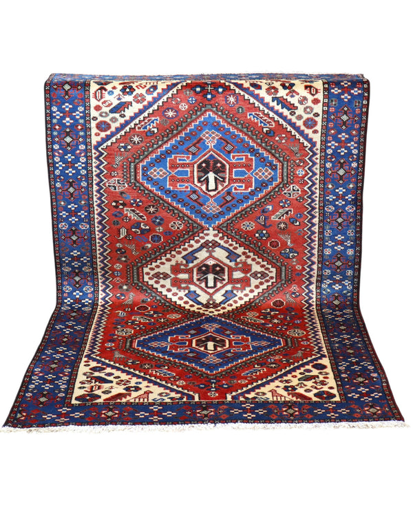 Tappeto Salame persiano 203x130 cm, annodato a mano, con tre medaglioni romboidali geometrici su fondo rosso e blu.