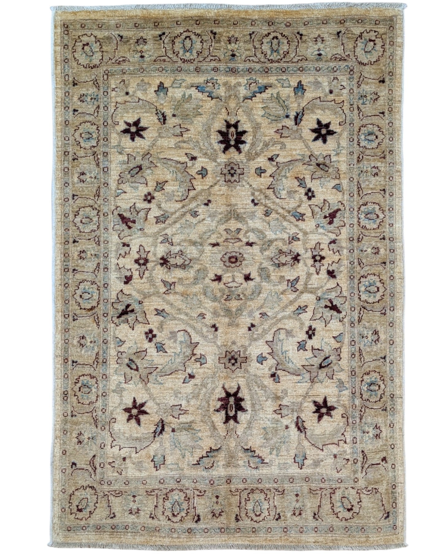 Tappeto Ziegler 182x125 cm con fondo beige e motivi floreali marroni e azzurri, tramato ed annodato a mano, provenienza Afghanistan.