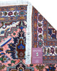 Tappeto Ardabil 187x136 cm persiano, annodato a mano, fondo rosa antico con medaglione geometrico blu e motivi floreali stilizzati.