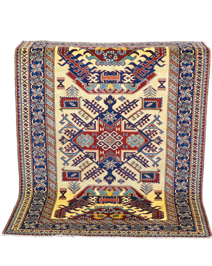 Tappeto Shirvan Afghan 164x117 cm, annodato a mano, con campo avorio, medaglione geometrico centrale e bordo decorato.