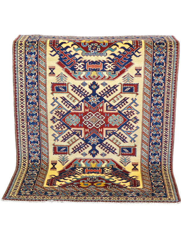 Tappeto Shirvan Afghan 164x117 cm, annodato a mano, con campo avorio, medaglione geometrico centrale e bordo decorato.