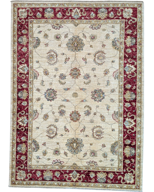 Tappeto Ziegler 175x127 cm, annodato a mano, fondo avorio con motivi floreali stilizzati e cornice rosso rubino.