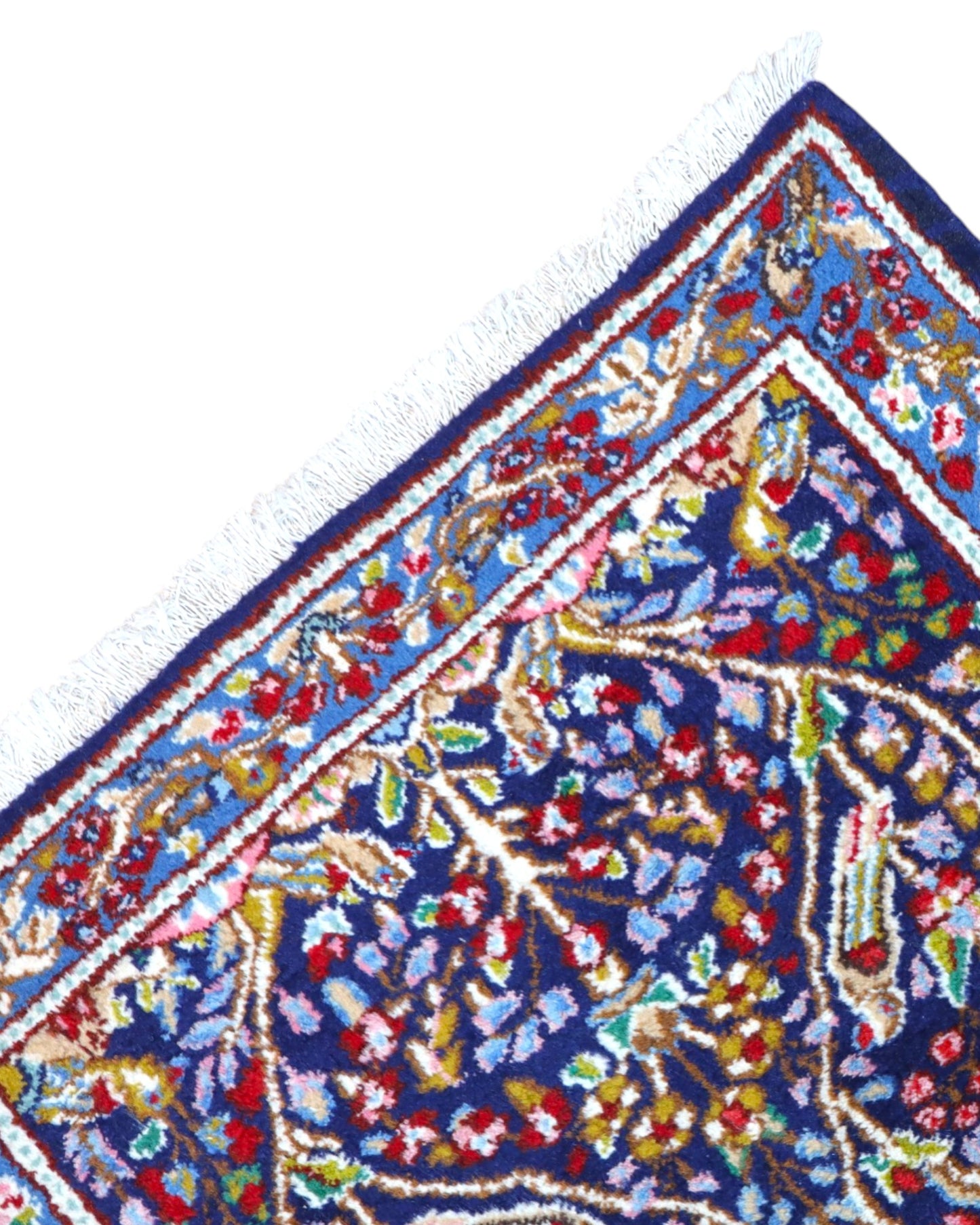 Tappeto Kerman floreale blu 145x89 cm in camera da letto