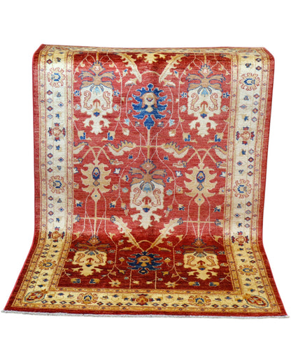 Tappeto Ziegler 170x120 cm con fondo rosso bordeaux e motivi floreali avorio e blu, tramato ed annodato a mano, provenienza Afghanistan.