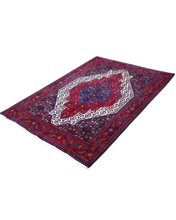 Tappeto Senneh 174x122 cm, annodato a mano, con grande medaglione geometrico centrale e motivi floreali su campo rosso e blu.