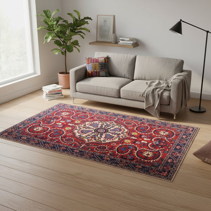 Tappeto Bakhtiyari rosso mattone con cornice blu e motivi decorativi, annodato a mano in Persia in lana e cotone tinti con colori vegetali.