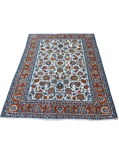 Tappeto Esfahan 182x124 cm annodato a mano, rettangolare, fondo chiaro con motivi floreali persiani, realizzato in cotone e lana con colori vegetali.