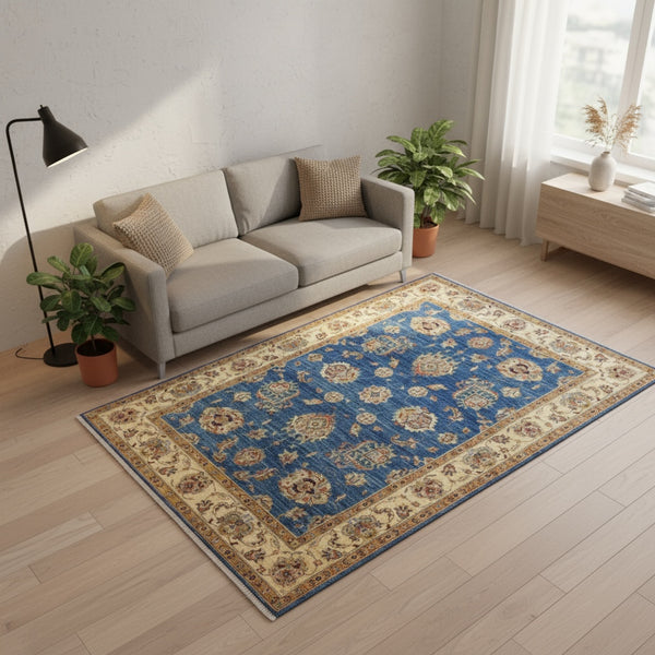 Tappeto Farahan Ziegler blu con cornice beige e motivi floreali, annodato a mano in Afghanistan in pura lana tinta con colori vegetali.