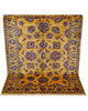 Tappeto Farahan Ziegler oro e blu notte, annodato a mano in Afghanistan. Realizzato in lana e cotone con colori vegetali, unisce eleganza floreale e tradizione artigianale.