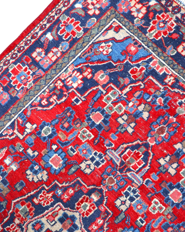 Tappeto Hamedan 190x127 cm annodato a mano, rettangolare, fondo rosso con motivi floreali e geometrici, realizzato in cotone e lana con colori vegetali.