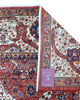 Tappeto Heriz marrone bruciato con cornice beige e motivi decorativi, annodato a mano in Persia con lana e cotone tinti con colori vegetali.