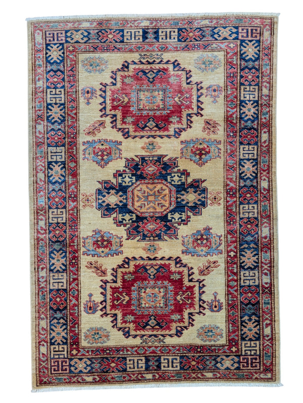Tappeto Kazak 171x117 cm, annodato a mano in lana pregiata, motivi geometrici caucasici con medaglioni e bordura decorata.