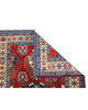 Tappeto Kazak rosso con cornice beige e motivi geometrici, annodato a mano in Afghanistan in lana e cotone con colori vegetali.